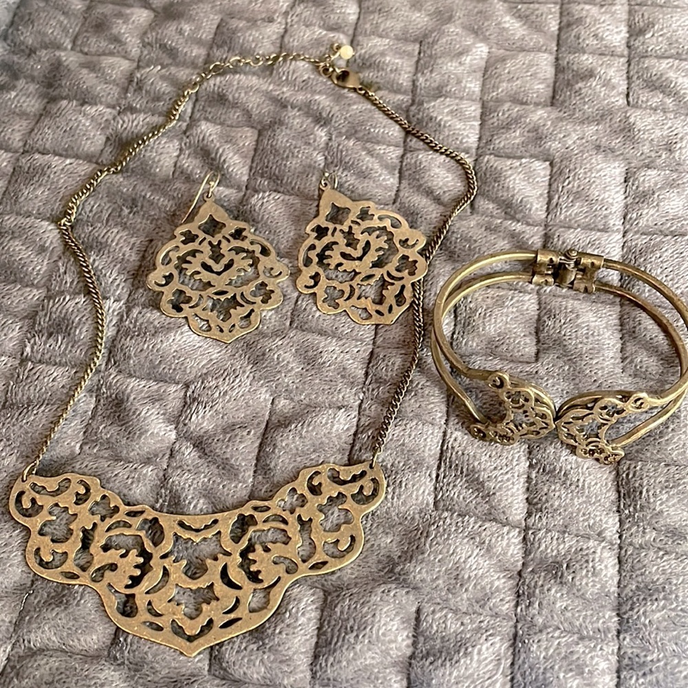 Necklace, bracelet and earrings set. Antiqued Gold boho style from Avon